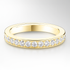 Gold wedding ring with diamonds on a light grey background
