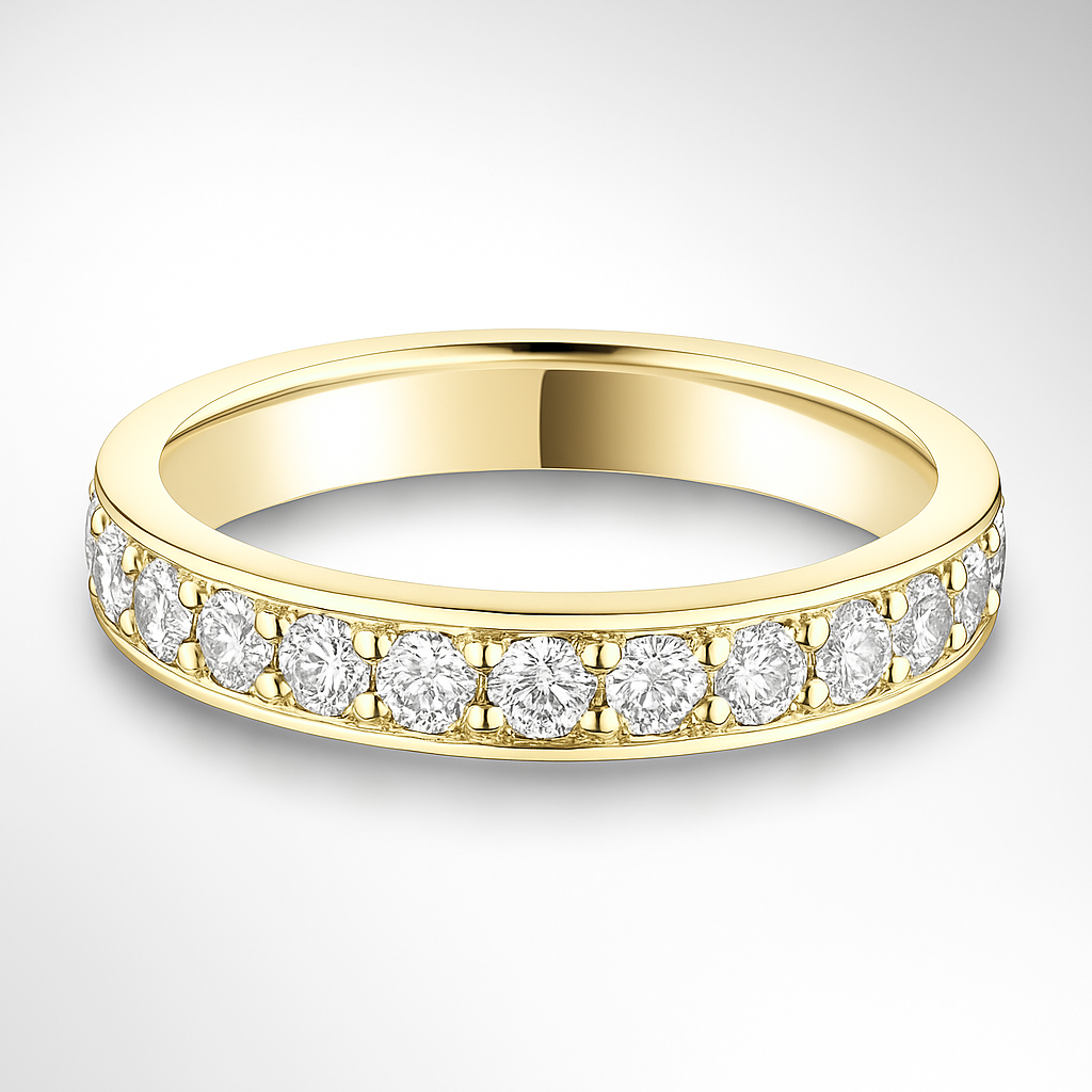 Gold wedding ring with diamonds on a white background