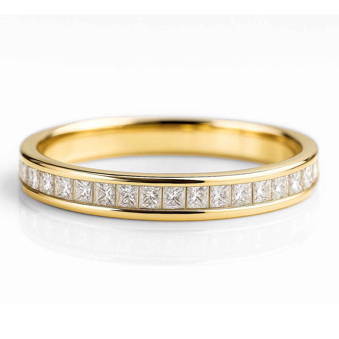 Gold ring with diamond accents on a white background