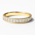 Gold ring with diamond accents on a white background